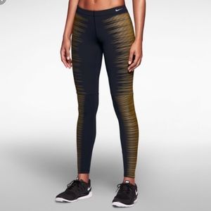 Nike Black and Reflective Gold Striped Leggings